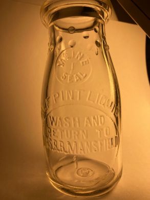 Mrs. B.B. Mansfield half pint milk bottle