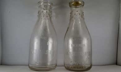 Mrs. B.B. Mansfield one quart milk bottles